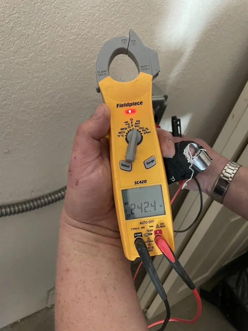 Voltage testing with clamp meter during Outlet Installation in White City